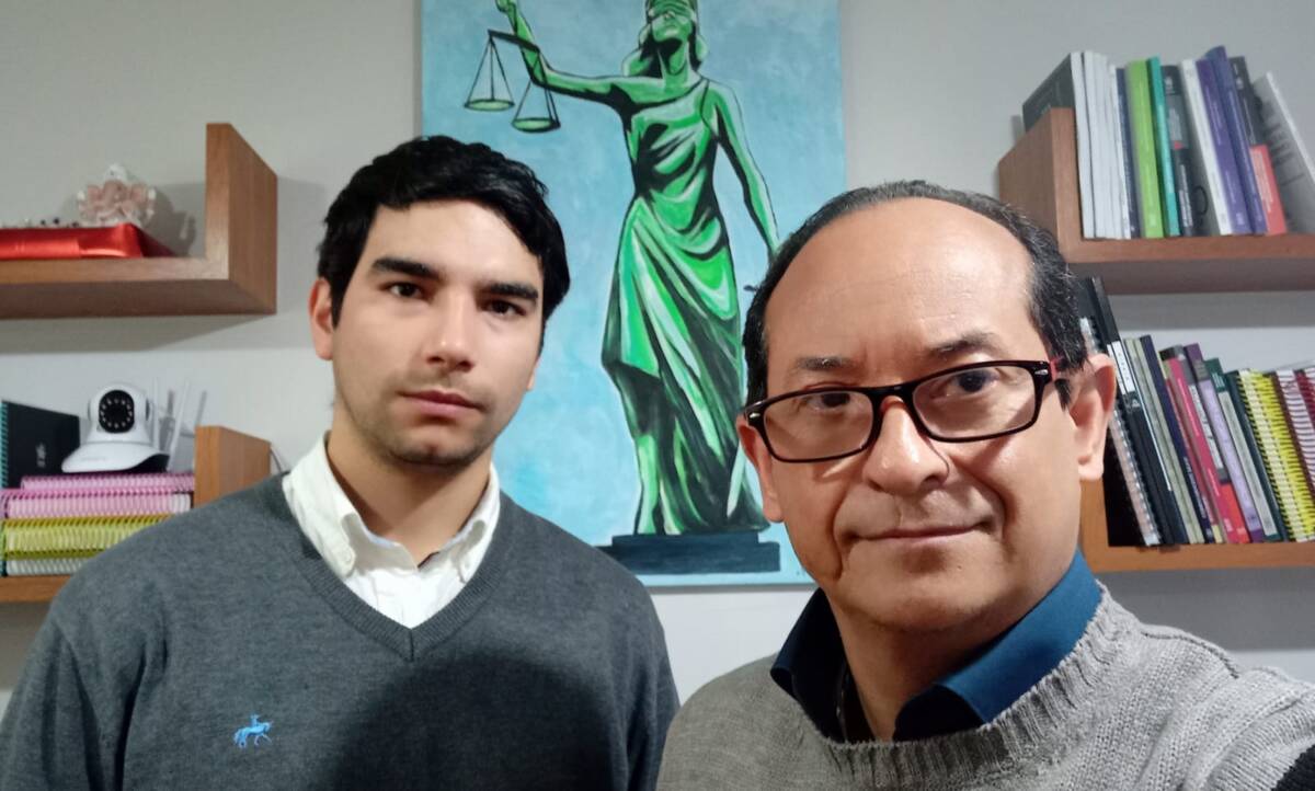 Ignacio García y Osvaldo Llinas, integrantes de Defensa Migrantes.
